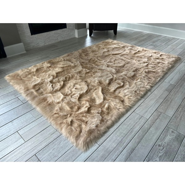 Light brown faux sheepskin rug