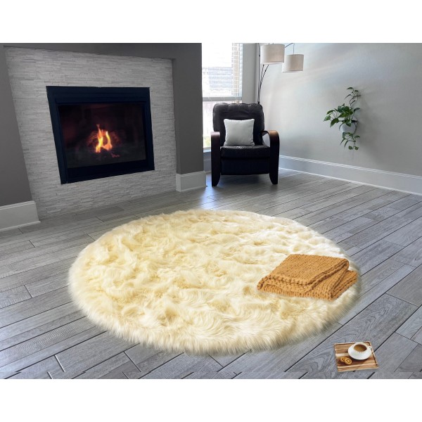 Beige round faux sheepskin rug