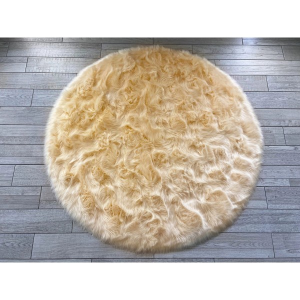 Beige round faux sheepskin rug