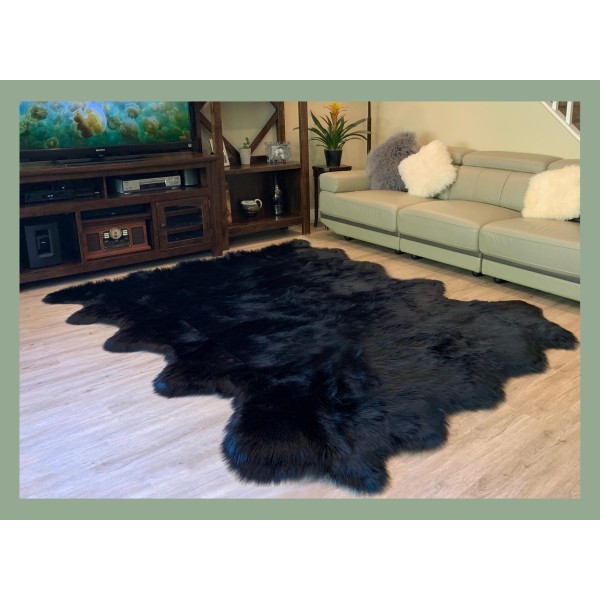 Black faux sheepskin rug
