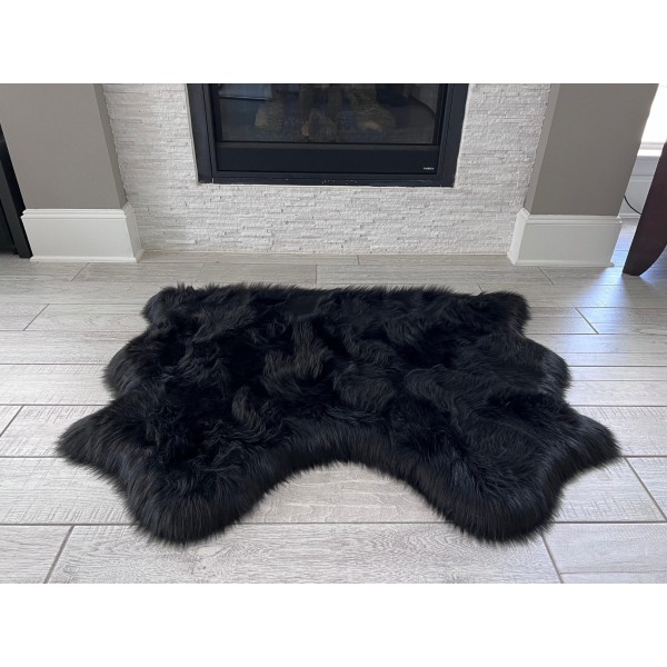 Black faux sheepskin rug