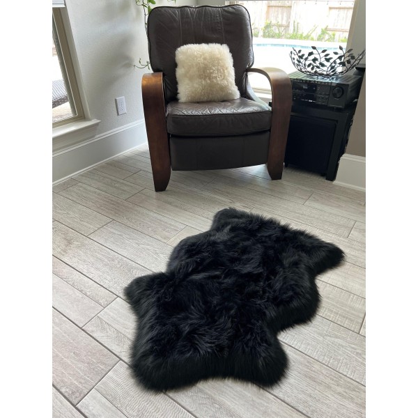 Black faux sheepskin rug