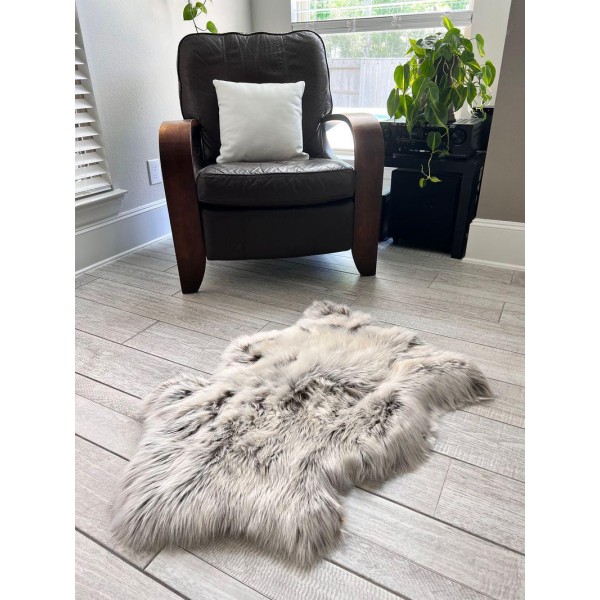Soft textured faux fur rug