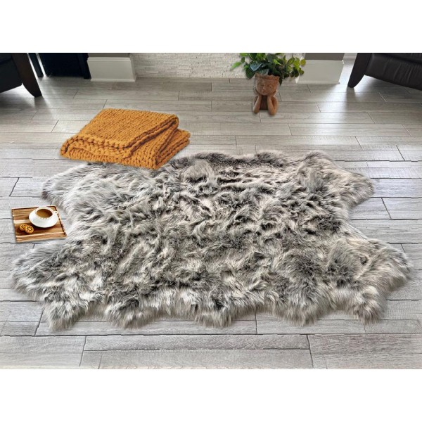 Soft textured faux fur rug