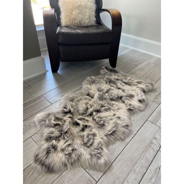 Soft textured faux fur rug