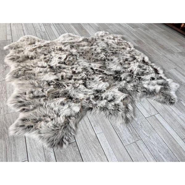 Soft textured faux fur rug