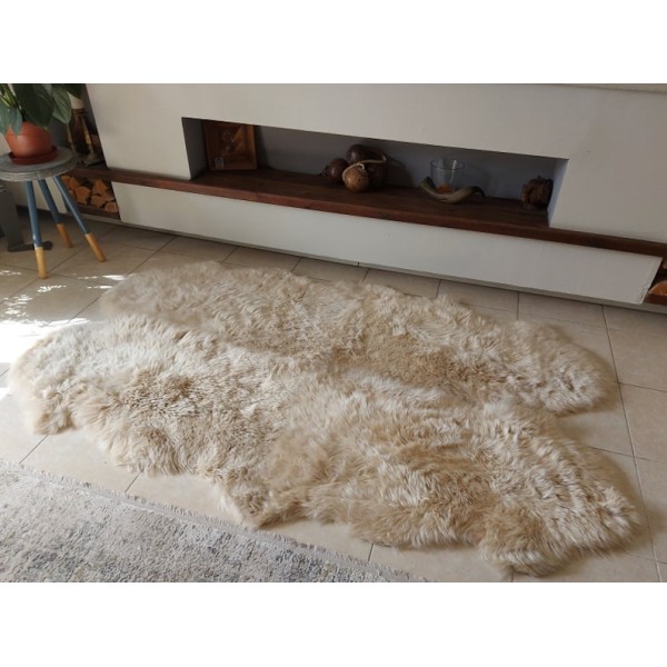 Light beige faux fur rug