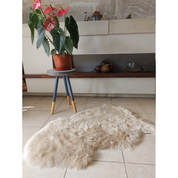 Light beige faux fur rug