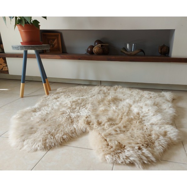 Light beige faux fur rug